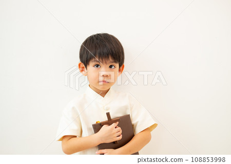 Little Asian boy praying with holding the cross, Christian concept Little Asian boy praying with holding the cross, Christian concept 108853998