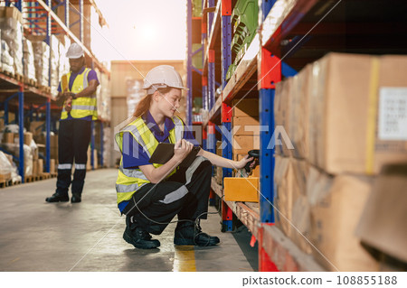 warehouse worker. inventory clerk staff stock employee work in cargo storage shelf managed checking shipping order using tablet. 108855188