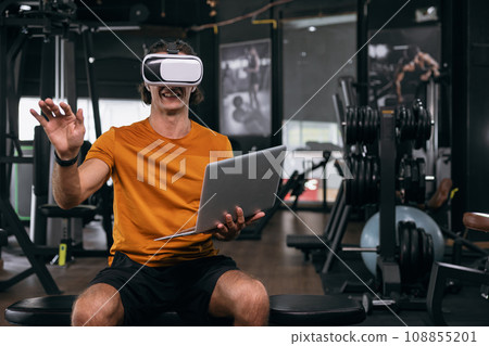 Sport male using VR headset advance visual technology practise learning body fitness Sport male using VR headset advance visual technology practise learning body fitness 108855201