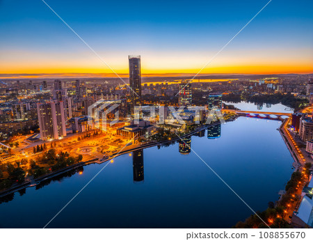 Yekaterinburg city and pond aerial panoramic view at summer or early autumn night. Night city in the early autumn or summer. 108855670