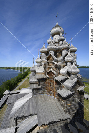 Aerial view of domes and crosses of medieval wooden Church on Kizhi Island on Onega Lake in Karelia 108856168
