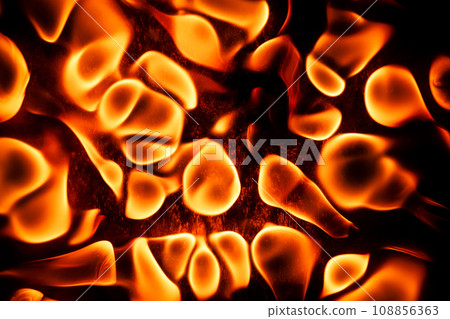 Beautiful liquid red, orange fire texture on black background. Fire in waves Beautiful liquid red, orange fire texture on black background. Fire in waves 108856363