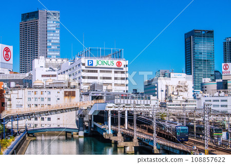 Yokohama cityscape in Japan View of Sotetsu Line Yokohama Station and trains entering the platform 108857622