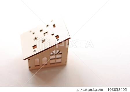 Cute miniature house made of wood Cute miniature house made of wood 108858405