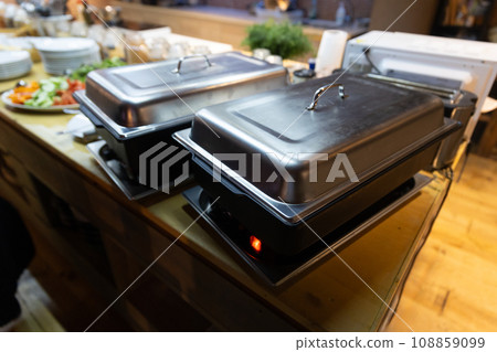 closed iron trough with food in the kitchen closed iron trough with food in the kitchen 108859099
