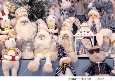 Fairytale Nordic Christmas characters on store counter. Dwarves, elves, rabbits 108859902