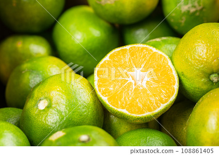 fresh citrus fruits on wooden table 108861405