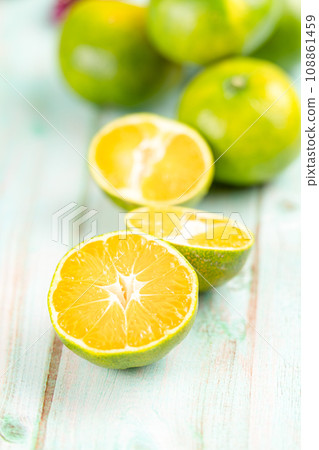 fresh citrus fruits on wooden table 108861459