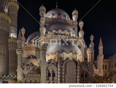 Al Sahaba Mosque in Sharm El Sheikh, Egypt fuses Fatimid, Mamluk and Ottoman style elements into its architecture and interior design. Night view Al Sahaba Mosque in Sharm El Sheikh, Egypt fuses Fatimid, Mamluk and Ottoman style elements into its architecture and interior design. Night view 108862794