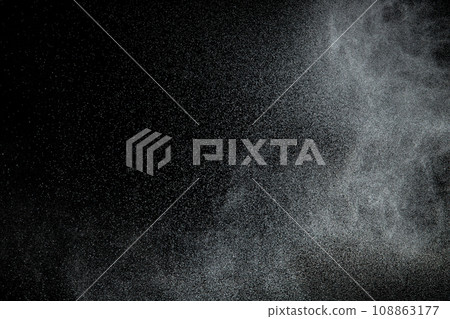 Million of Star Dust, Photo image of falling down shower rain snow, heavy snows storm flying. Freeze shot on black background isolated overlay. Spray water fog smoke as star particle on wind 108863177
