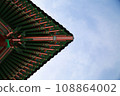 red roof with blue sky 108864002