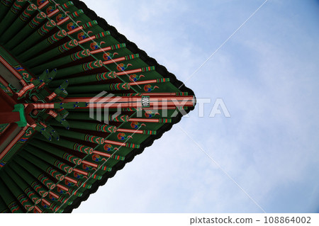 red roof with blue sky red roof with blue sky 108864002