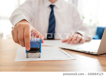 Lawyer or notary working in the office. 108864125