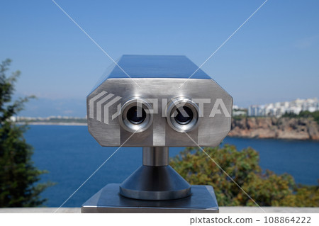Inspection binoculars on the waterfront. Inspection binoculars on the waterfront. 108864222