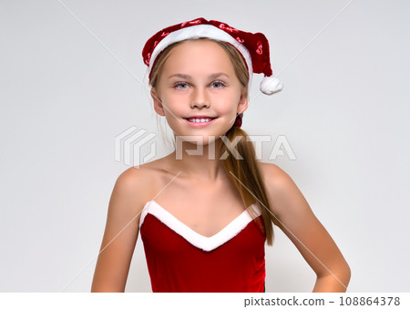 Portrait photo of Christmas image, young smiling Caucasian girl in Santa Claus cosplay costume, AI-generated image 108864378
