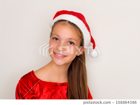 Christmas portrait portrait, smiling white girl wearing a Santa Claus hat, AI-generated image 108864386