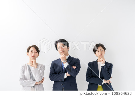 Business men and women worry 108864623