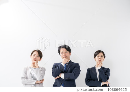 Business men and women worry 108864625