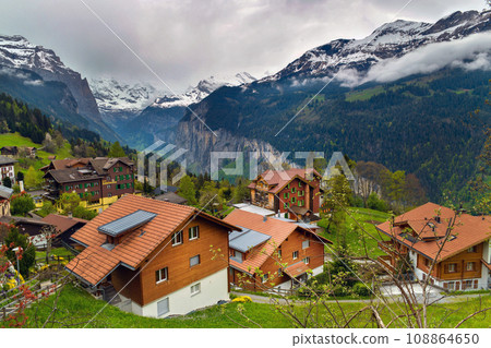 View of alpine Wengen village Beautiful outdoor scene in Switzerland View of alpine Wengen village Beautiful outdoor scene in Switzerland 108864650