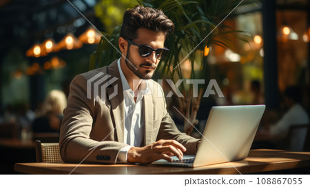 Work remotely without being tied to an office or outsource a specialist for business efficiency. Young businessman in glasses works on a laptop in an office space Work remotely without being tied to an office or outsource a specialist for business efficiency. Young businessman in glasses works on a laptop in an office space 108867055
