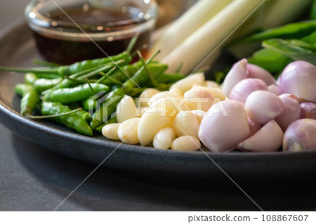 Herb ingredients for Thai Food cooking menu on the counter kitchen ready to process. Herb ingredients for Thai Food cooking menu on the counter kitchen ready to process. 108867607