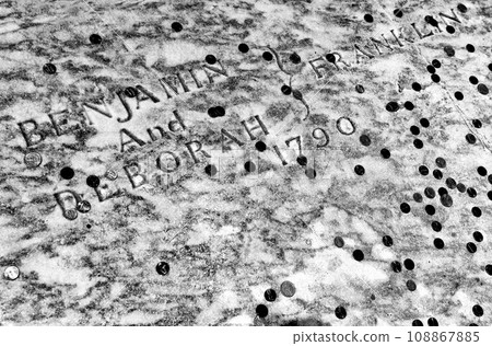 Benjamin Franklin grave covered in coins at Christ Church Burial Ground in Philadelphia, PA, USA Benjamin Franklin grave covered in coins at Christ Church Burial Ground in Philadelphia, PA, USA 108867885