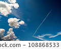 Contrails in the blue summer sky 108868533