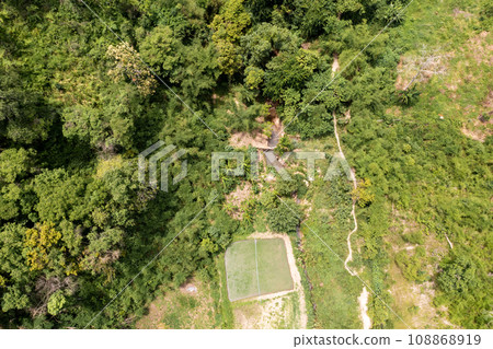 A check dam or a weir is a barrier that stops or restricts the flow of surface water or underground streams. Reservoirs created by dams not only suppress floods but also provide water for activities. 108868919