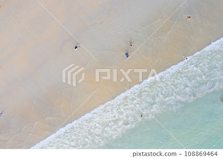 top view flatlay aerial of Phuket Province Thailand with Copy Space zone on stunning beautiful turquoise sea landscape and surfman traveler on the beach. 108869464