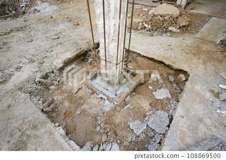Pile was held by steel rods on the ground with cement and sand 108869500