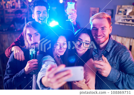 Selfie Time.Young Group of Friends Partying In A Nightclub And Toasting Drinks. Happy Young People. 108869731