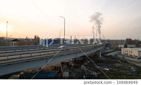 Drone view of the bridge passing through the city. 108869849