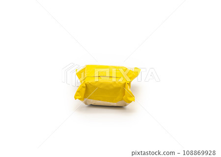 Isolated Yellow Postal Package from shopping online, is delivered to the buyer. It's shot in the studio light in front of white background 108869928