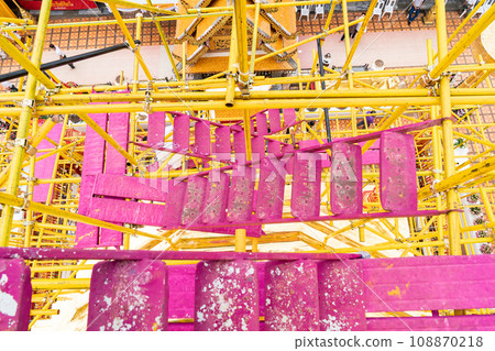 Around Phra That Doi Suthep there are many red and yellow scaffolding which is quite dusty and dirty. 108870218
