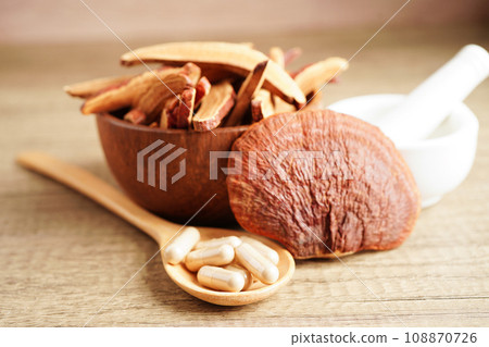 Lingzhi or Reishi mushroom with capsules, organic natural healthy food. 108870726