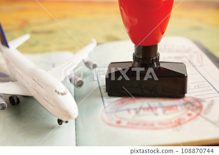 Visa and passport with approved stamp on document for tourism to immigration at airport in country. Visa and passport with approved stamp on document for tourism to immigration at airport in country. 108870744