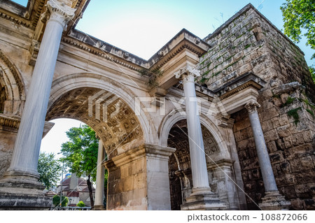 Adrian Gate, Antalya landmark, Turkey. Antique construction of marble and limestone. Adrian Gate, Antalya landmark, Turkey. Antique construction of marble and limestone. 108872066