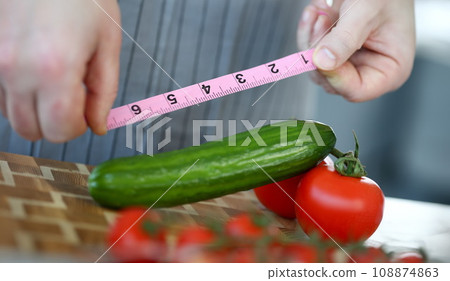 Male Hands Measure Green Ripe Cucumber Length 108874863
