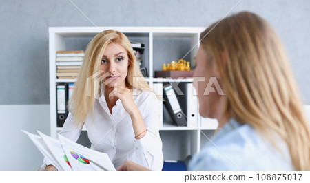 Beautiful smiling businesswoman portrait at workplace Beautiful smiling businesswoman portrait at workplace 108875017