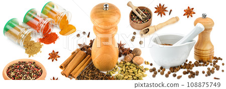 Set of spices and condiments isolated on a white background. Collage. Wide photo. Set of spices and condiments isolated on a white background. Collage. Wide photo. 108875749