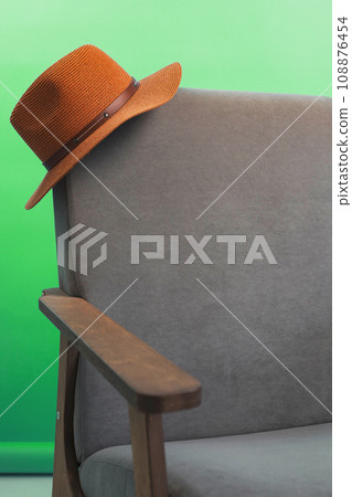 a hat on the edge of a chair, rest concepts, a day off. Rest 108876454