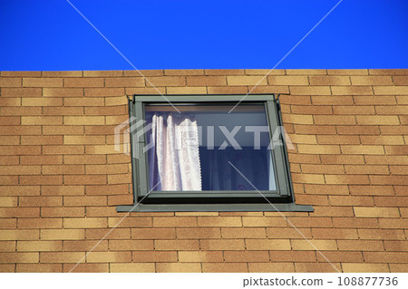 A window of a neighbor in the house opposite A window of a neighbor in the house opposite 108877736