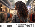woman african america shopping in supermarket or department store. 108879031