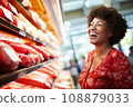 woman african america shopping in supermarket or department store. 108879033
