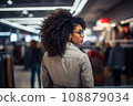 woman african america shopping in supermarket or department store. 108879034