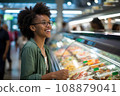 woman african america shopping in supermarket or department store. 108879041