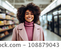 woman african america shopping in supermarket or department store. 108879043