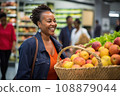 woman african america shopping in supermarket or department store. 108879044