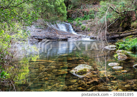 Pincho Waterfall near Viana do Castelo, Northern Portugal. View of the flowing water and beautiful lagoon, in the woods 108881895