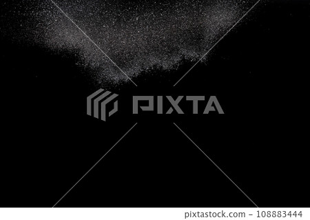 Explosion metallic black glitter sparkle. Dark Glitter powder spark blink celebrate, blur foil explode in air, fly throw black glitters particle. Black background isolated, selective focus Blur bokeh 108883444